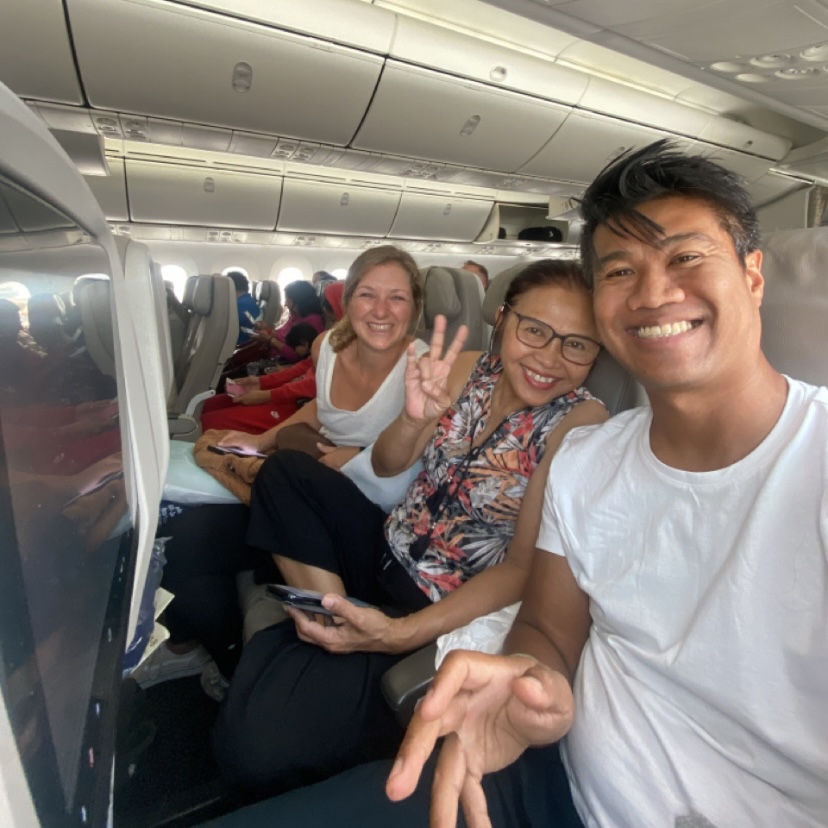 Sanit, Weeri and I in the plane to Bangkok Thailand